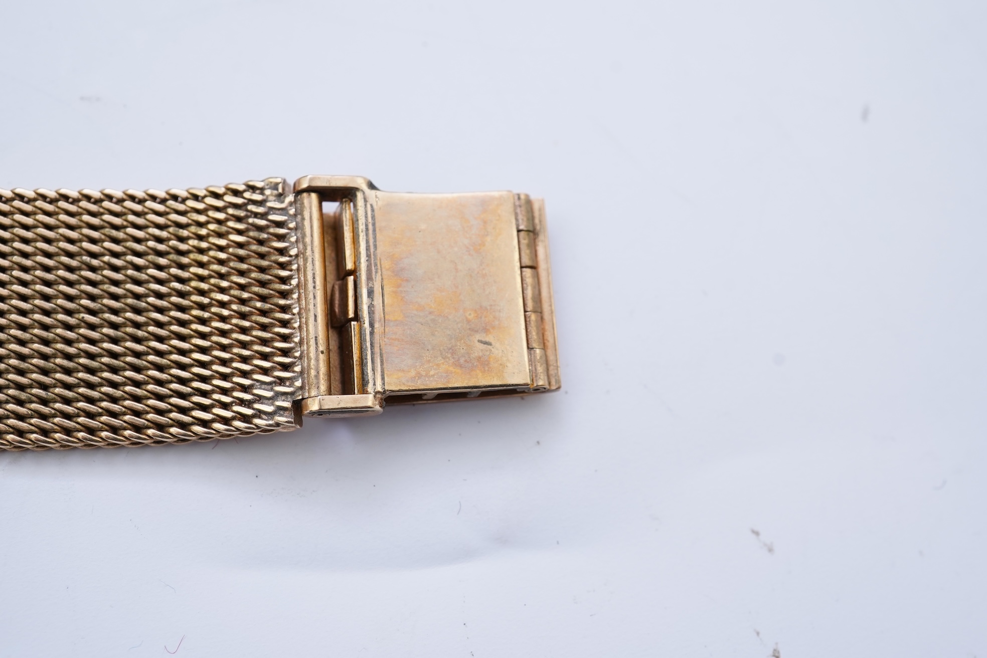 A gentleman's late 1960's 18ct gold Omega Constellation Automatic Chronometer Officially Certified wrist watch, on an associated 9ct gold mesh link bracelet